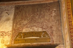 Decorative painting around a memorial plaque